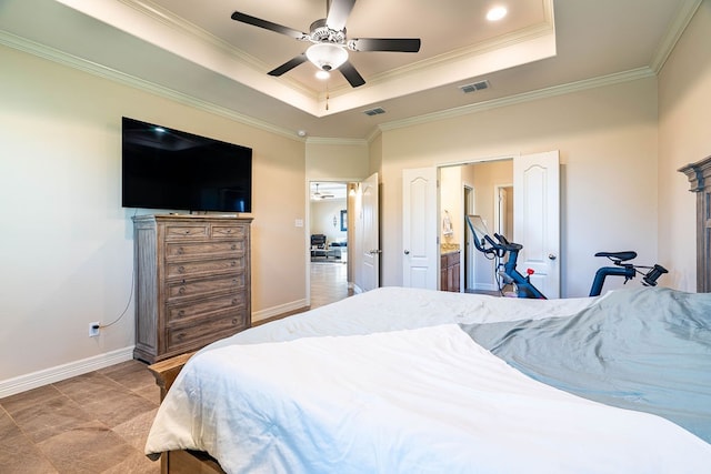 bedroom featuring a raised ceiling, ceiling fan, and crown molding