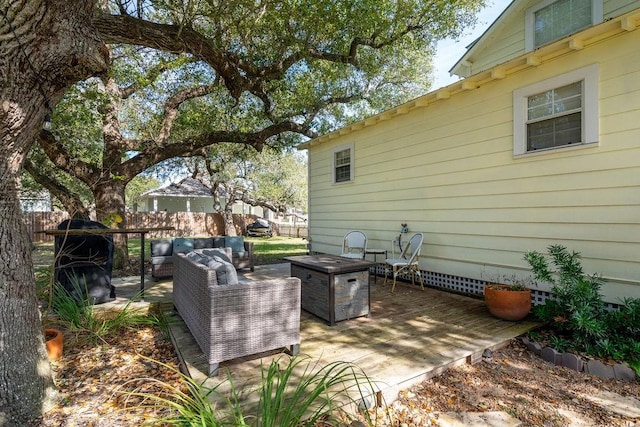 view of patio with a wooden deck and outdoor lounge area