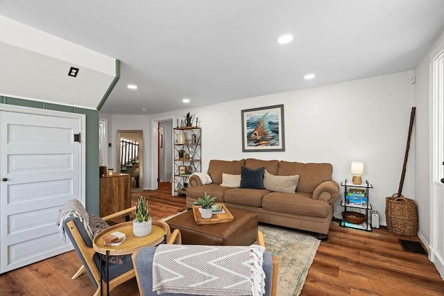 living room with dark hardwood / wood-style floors