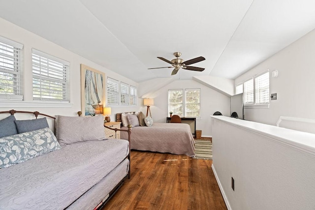 bedroom featuring lofted ceiling, ceiling fan, and dark hardwood / wood-style floors