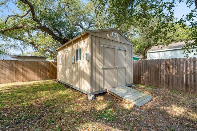 view of outdoor structure with a yard