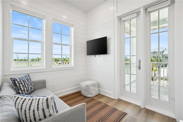 320 S Shore Dr, Port Aransas, TX 78373 - living area with wood finished floors and healthy amount of natural light