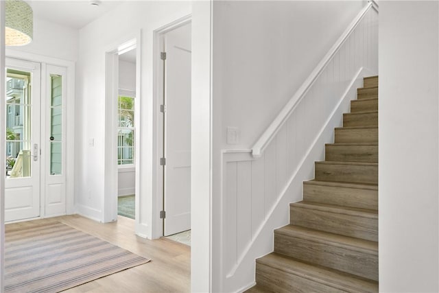 320 S Shore Dr, Port Aransas, TX 78373 - foyer featuring stairs and wood finished floors