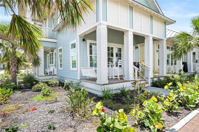 320 S Shore Dr, Port Aransas, TX 78373 - view of property exterior with a porch