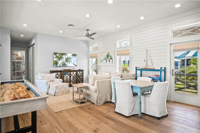 328 Coastline Dr, Port Aransas, TX 78373 - dining space featuring plenty of natural light, light wood-style flooring, ceiling fan, and recessed lighting