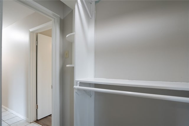 4249 Dody St, Corpus Christi, TX 78411 - hallway featuring light tile patterned floors and baseboards