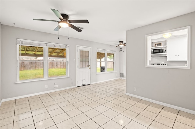 4249 Dody St, Corpus Christi, TX 78411 - spare room with ceiling fan and light tile patterned flooring