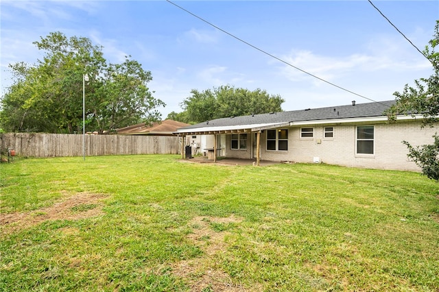 4249 Dody St, Corpus Christi, TX 78411 - back of house with a patio and brick siding