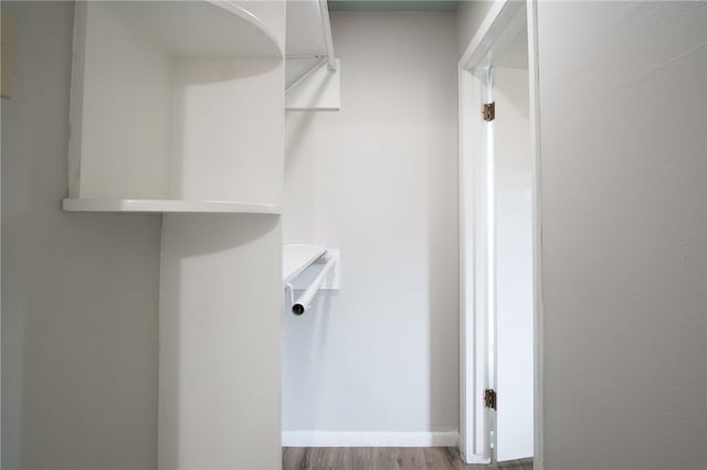 4249 Dody St, Corpus Christi, TX 78411 - walk in closet with wood finished floors