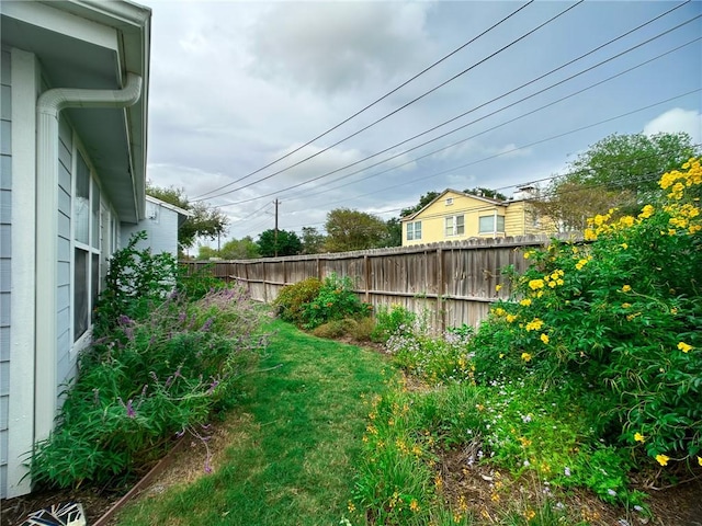 view of yard with fence