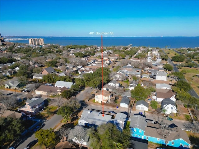 bird's eye view with a water view and a residential view