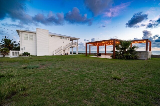 204 Bayshore Dr, Ingleside, TX 78362 - view of grassy yard with stairway