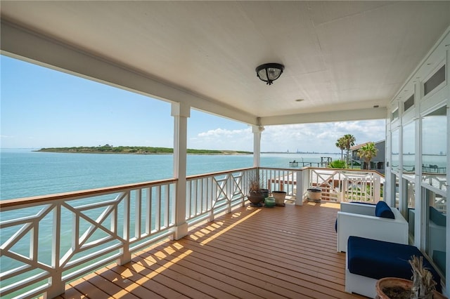 204 Bayshore Dr, Ingleside, TX 78362 - wooden terrace with a water view