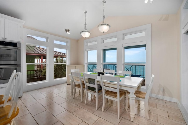 204 Bayshore Dr, Ingleside, TX 78362 - dining space featuring lofted ceiling and light tile patterned floors