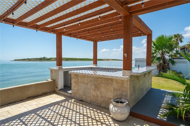204 Bayshore Dr, Ingleside, TX 78362 - view of patio / terrace featuring a water view and a pergola