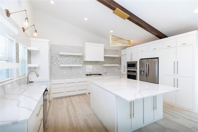 kitchen with backsplash, open shelves, vaulted ceiling with beams, appliances with stainless steel finishes, and a sink