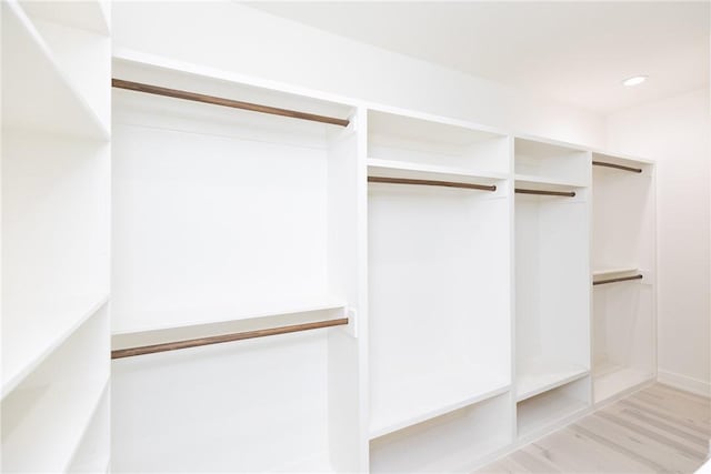 spacious closet with wood finished floors