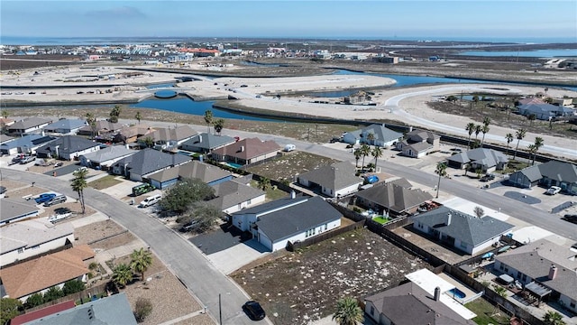 aerial view featuring a residential view and a water view