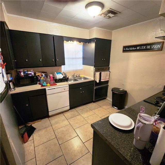 kitchen with black appliances, sink, light tile patterned floors, and ornamental molding