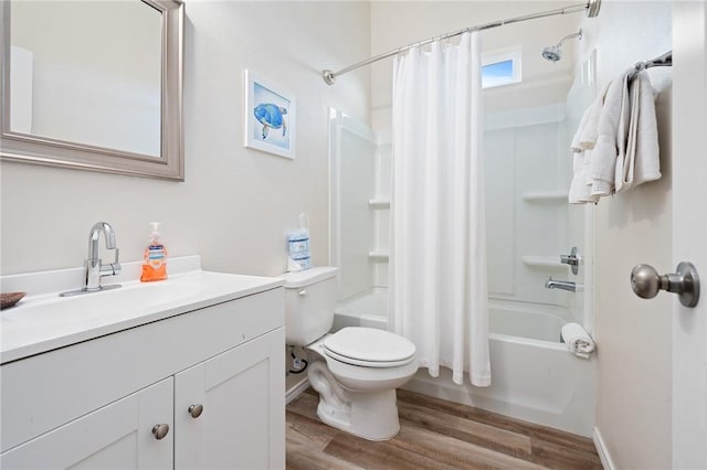 111 Great Chagos, Rockport, TX 78382 - bathroom with wood finished floors, shower / bath combo with shower curtain, toilet, and vanity