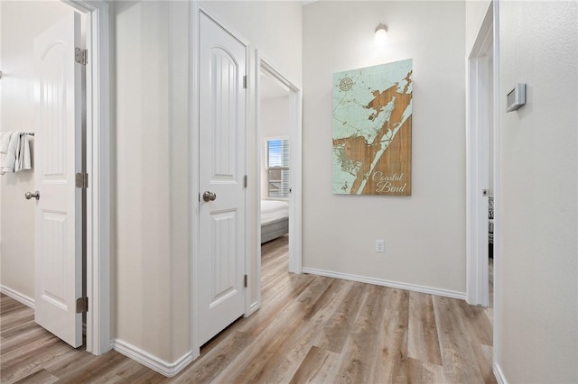 111 Great Chagos, Rockport, TX 78382 - corridor featuring light wood-style flooring and baseboards
