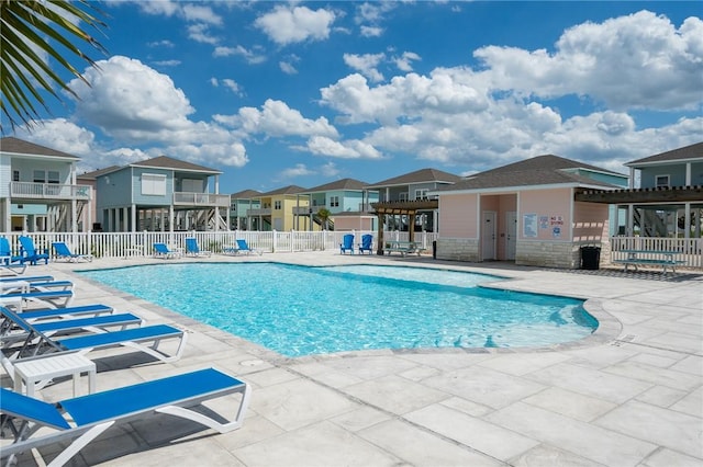 111 Great Chagos, Rockport, TX 78382 - community pool featuring a patio area and a residential view