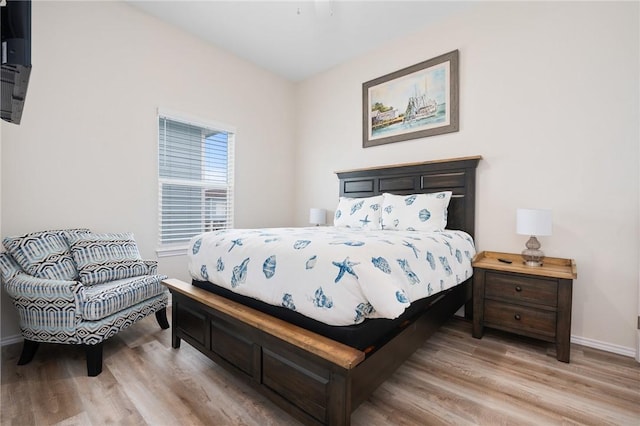 111 Great Chagos, Rockport, TX 78382 - bedroom featuring light wood-type flooring and baseboards