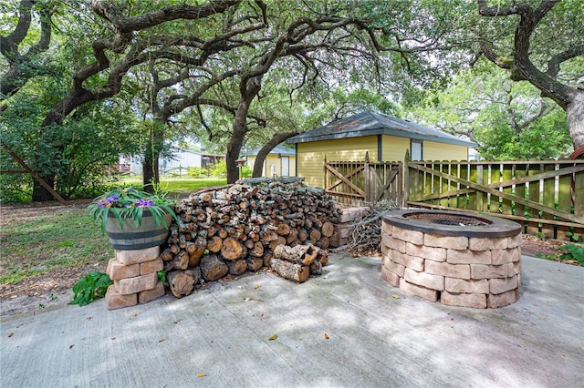 view of patio / terrace with a fire pit