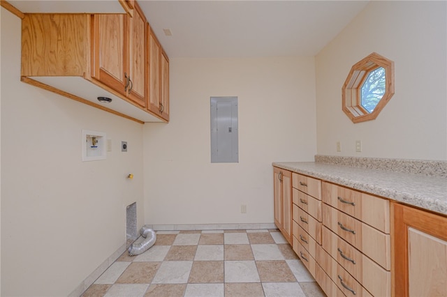 laundry area featuring electric panel, cabinets, hookup for a washing machine, and hookup for an electric dryer