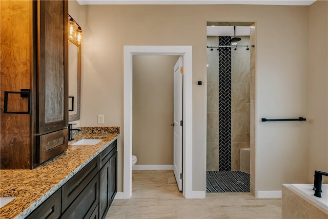 1530 Bay Moon Ct, Corpus Christi, TX 78417 - full bathroom featuring double vanity, tiled shower, toilet, baseboards, and a bath