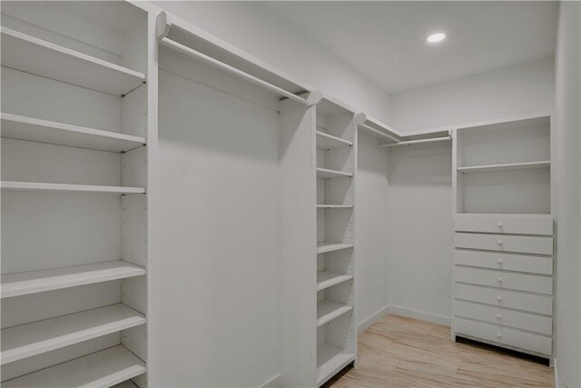 1530 Bay Moon Ct, Corpus Christi, TX 78417 - walk in closet with wood finished floors