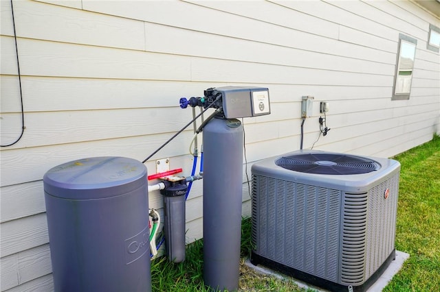 7618 Dove Hollow Dr, Corpus Christi, TX 78414 - exterior view of central AC unit and a water softener system