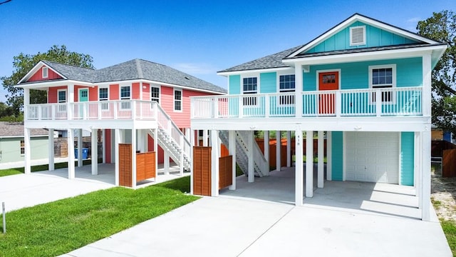 view of front of property featuring a garage and covered porch