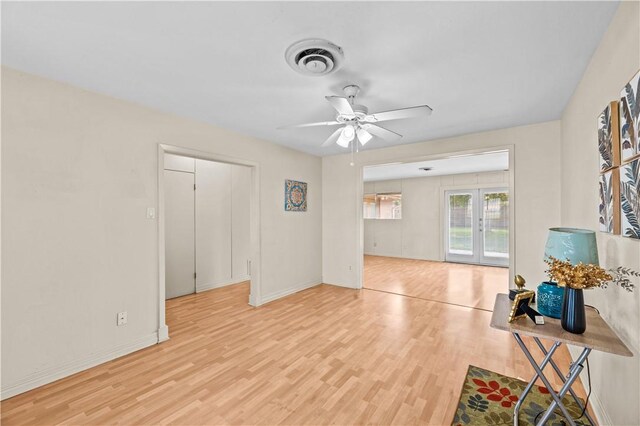 857 Belmeade Dr, Corpus Christi, TX 78412 - unfurnished living room with wood finished floors, ceiling fan, and baseboards