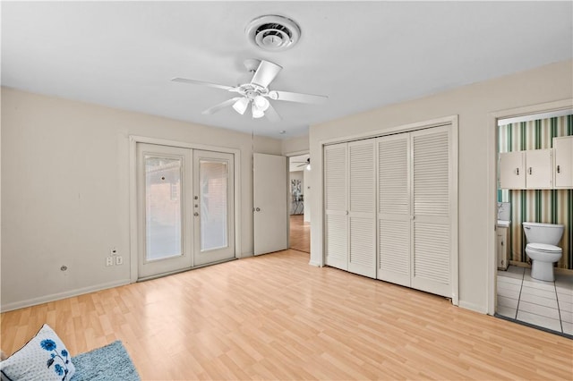 857 Belmeade Dr, Corpus Christi, TX 78412 - unfurnished bedroom with access to outside, wood finished floors, baseboards, and connected bathroom