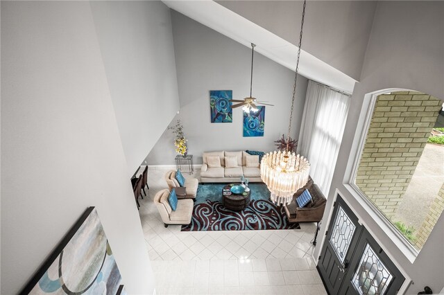 4705 Grand Lake Dr, Corpus Christi, TX 78413 - tiled living area with a high ceiling and ceiling fan