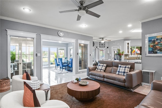 4705 Grand Lake Dr, Corpus Christi, TX 78413 - living area with ceiling fan, tile patterned floors, crown molding, and recessed lighting