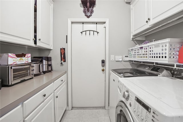 4705 Grand Lake Dr, Corpus Christi, TX 78413 - washroom with separate washer and dryer and cabinet space