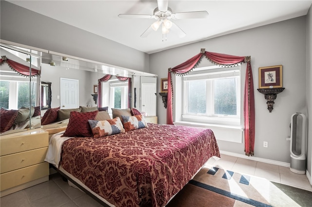 4705 Grand Lake Dr, Corpus Christi, TX 78413 - bedroom featuring light tile patterned floors and ceiling fan