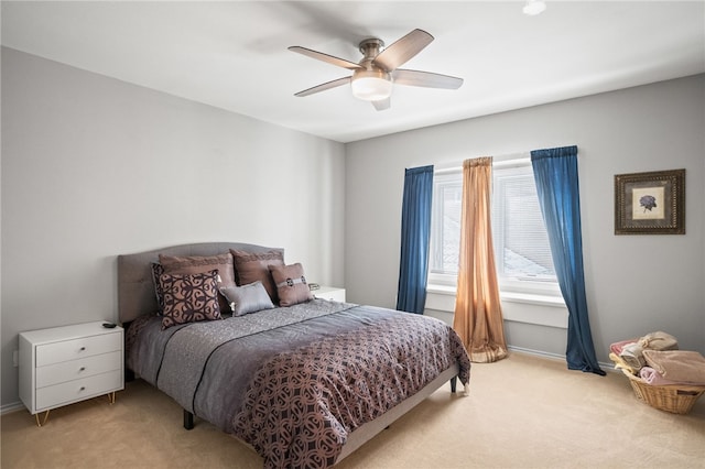 4705 Grand Lake Dr, Corpus Christi, TX 78413 - bedroom with light carpet and a ceiling fan