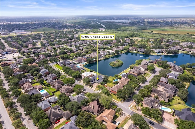 4705 Grand Lake Dr, Corpus Christi, TX 78413 - aerial perspective of suburban area with a large body of water