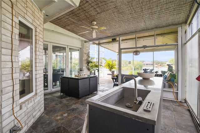 4705 Grand Lake Dr, Corpus Christi, TX 78413 - sunroom / solarium with a ceiling fan and an outdoor living space