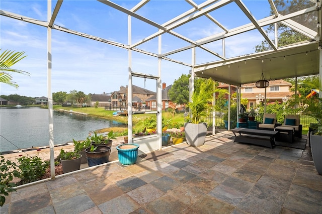 4705 Grand Lake Dr, Corpus Christi, TX 78413 - sunroom / solarium featuring a water view and an outdoor hangout area
