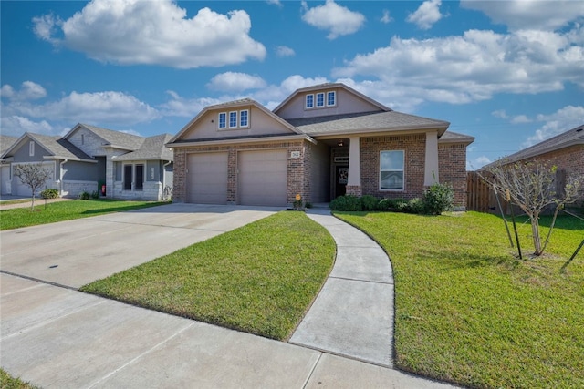 view of front facade with a front yard and a garage