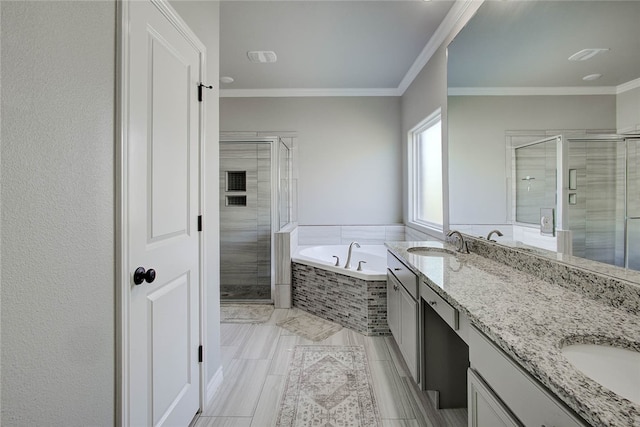 bathroom with ornamental molding, shower with separate bathtub, and vanity