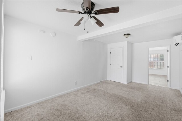 3618 Lawnview St, Corpus Christi, TX 78411 - unfurnished room with light colored carpet, a wall mounted AC, a ceiling fan, and baseboards