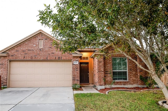 7717 Cattlemen Dr, Corpus Christi, TX 78414 - view of front facade with brick siding, concrete driveway, a garage, and a front yard