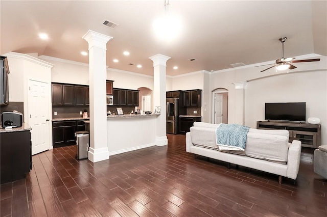 7717 Cattlemen Dr, Corpus Christi, TX 78414 - living room featuring ornate columns, a ceiling fan, ornamental molding, recessed lighting, and dark wood-type flooring
