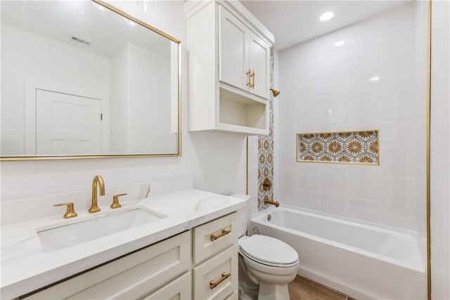 full bath featuring vanity, shower / bathtub combination, toilet, and visible vents
