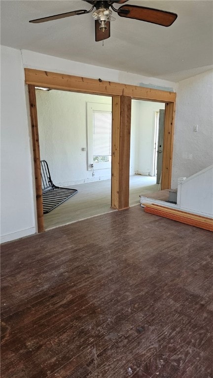 unfurnished room with ceiling fan and wood finished floors